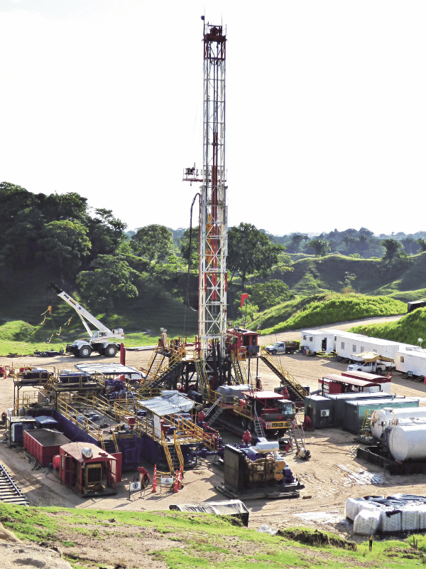 Drilling rig set up at a well location